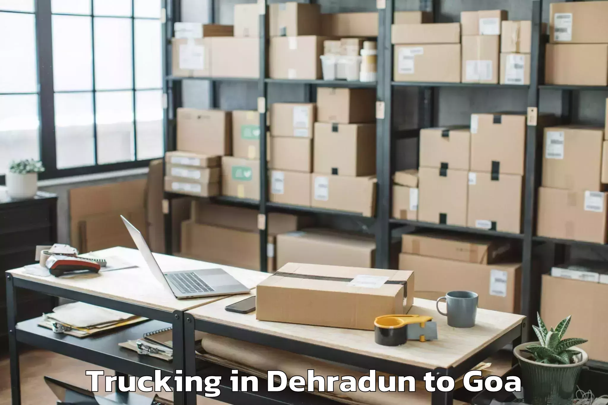 Book Dehradun to Davorlim Trucking Online